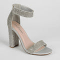 A single silver glitter block heel sandal with crystal-embellished straps and ankle strap, shown on a plain white background. The insole displays the brand name 'Forever'.